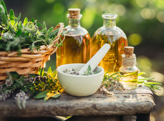 Herbal remedies arranged on a treatment table