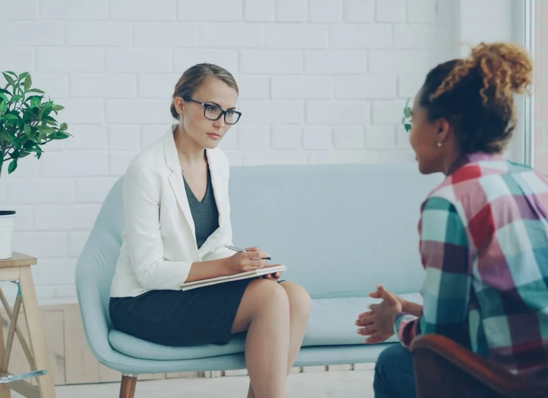 Mental health professional listening to a client