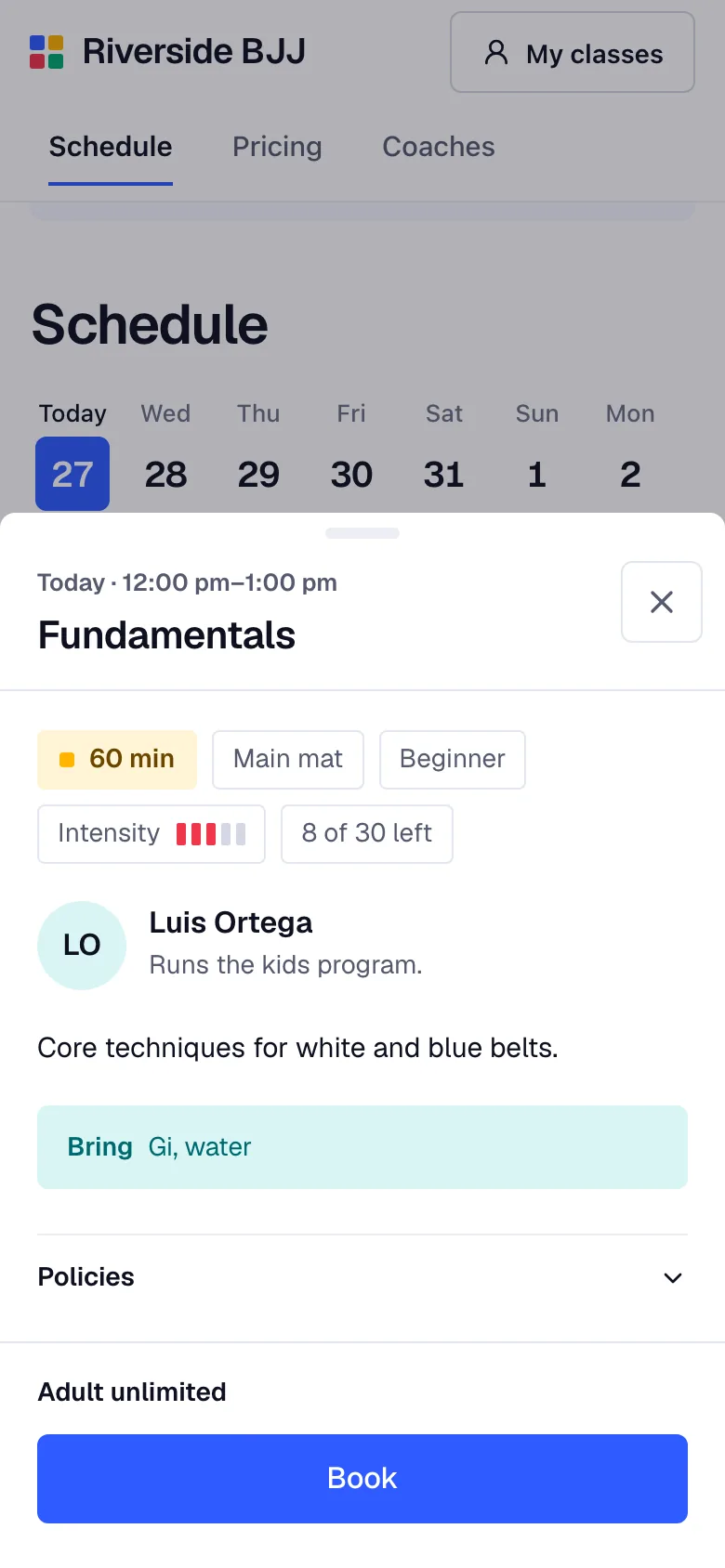 Booking a martial arts class on a phone in Bookify Martial Arts: class details, coach and the Book button.